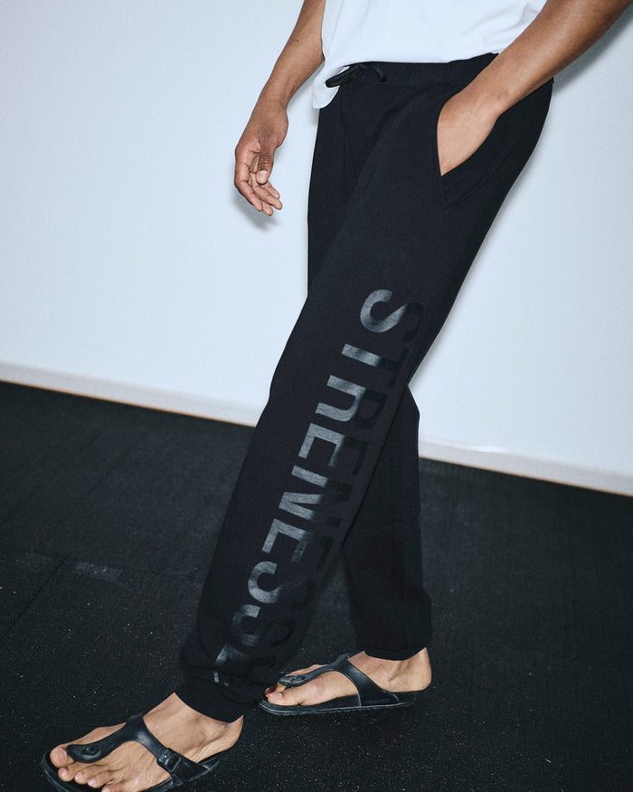 Jogging pants with logo print - unisex