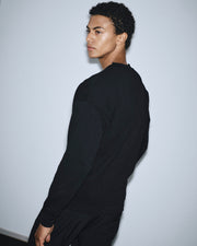 Sweatshirt with logo label - unisex