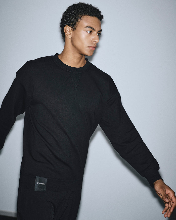 Sweatshirt with logo label - unisex